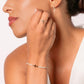 LUMINOUS CROSS PAVÉ RING